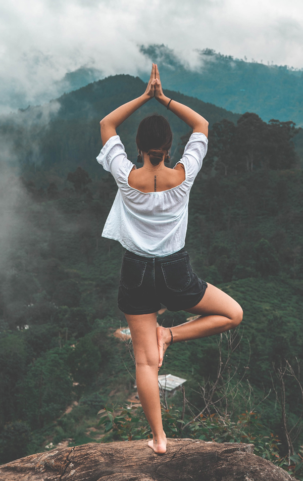 Yoga Teacher Performing Tree Posture